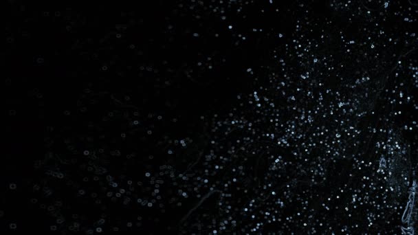 具有明亮粒子和纹理的黑暗背景的可变照明 — 图库视频影像
