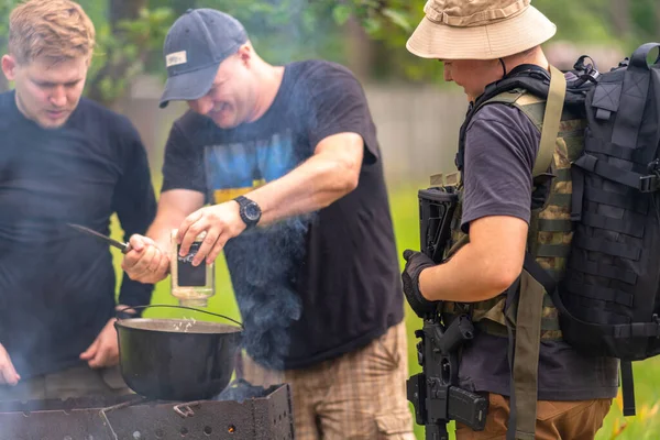 Three Men Light Military Uniforms Cook Dinner Outdoors — Stock Photo, Image