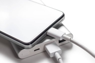 Smartphone charger with powerbank on white background.