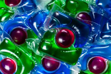 Liquid powder in gel capsule for washing multicolor,