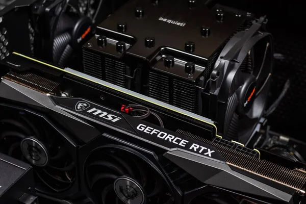 UKRAINE, DNIPRO, FEBRUARY 23, 2023: MSI Geforce RTX grafik kartı, PC veya madencilik sondajı için donanım bileşenleri.