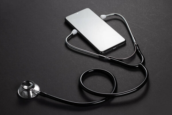 Mockup of the phone with the stethoscope checks the health. Online medical clinic communication with the patient. Telemedicine concept.. doctor online consultation concept.