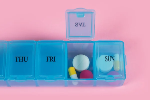 Pill Organizer Variety Pills Supplement Weekly Pill Organizer Pink Background — Stockfoto