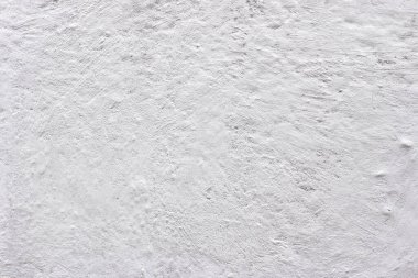 Boya dokusu beyazdır. Duvar sıva ve lekeleri arka plan. Bir ekran koruyucu veya bir tatil için bir kartpostal
