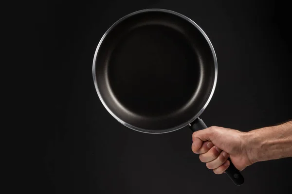 Hand Holding Frying Pan Dark Background — Stock Photo, Image