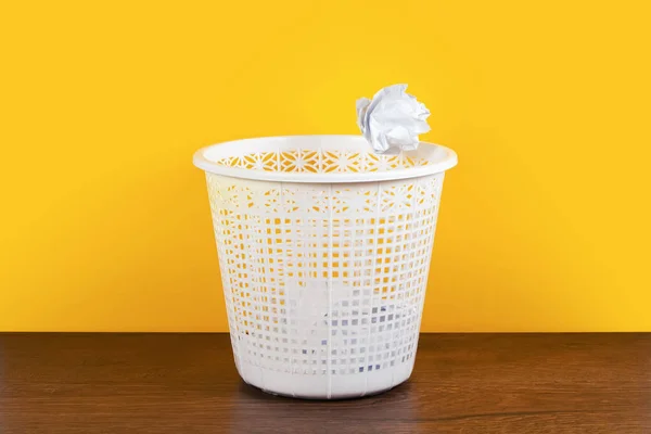 Throw it in the waste paper basket or bin concept for business frustration, stress and writers block.