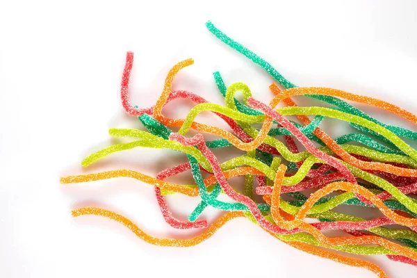 Multicolored Jelly Candies Shape Sticks Sprinkled Sugar White Background — Fotografia de Stock