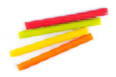 Çubuk şeklinde çok renkli jöle şekerler. Yaklaş..