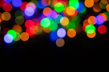 Noel ışığının soyut, dairesel bokeh arkaplanı,