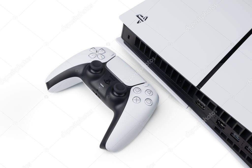 Dnipro Ukraine - dec 29, 2024: New Playstation 5 slim models and controller in isolated background.