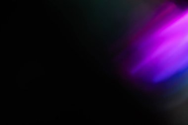 Soyut bulanık lensler siyah renkte parlıyor.