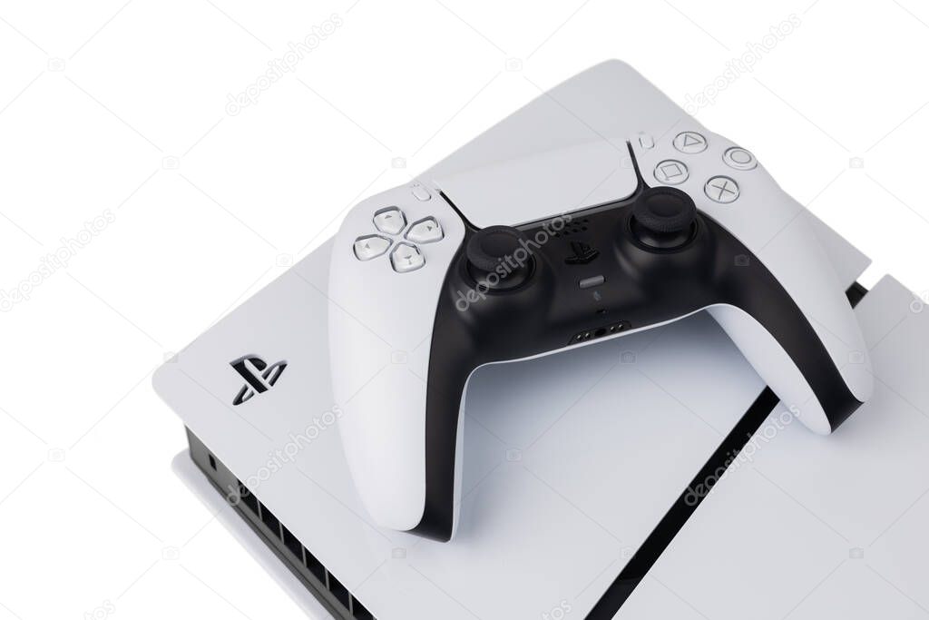 Dnipro Ukraine - dec 29, 2024: New Playstation 5 slim models and controller in isolated background.