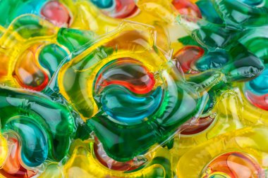 Çamaşır ve bulaşık makinesi için hepsi bir arada. Bulaşıkçılar kapsülleri arka plan.