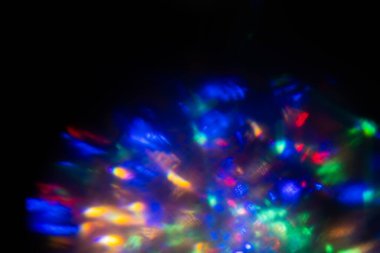 Soyut bulanık lensler siyah renkte parlıyor..