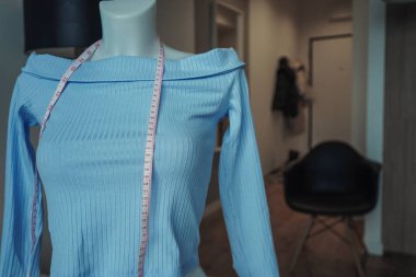 mannequin and measuring tape. Sewing at home. Startup sewing clothes.