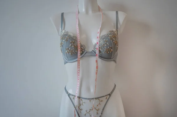 mannequin in lingerie and measuring tape. Sewing at home. Startup sewing clothes.