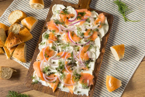 stock image Homemade Cream Cheese Lox Bagel Board for Breakfast with Salmon