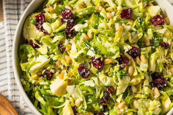 Homemade Brussel Sprout Salad with Cranberry Nuts and Cheese