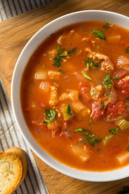 Homemade Manhattan Clam Chowder with Tomato and Parsley clipart