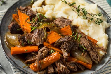 Homemade Beef Pot Roast with Carrots and Mashed Potatoes