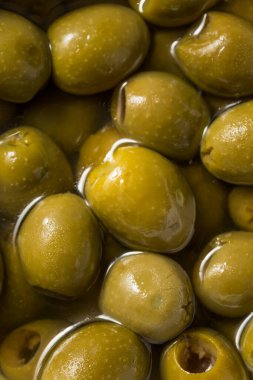 Raw Green Organic Marinated Olives in Oil