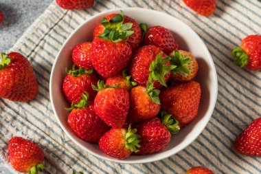 Raw Red Organic Sweet Strawberries in a Bowl Ready to Eat