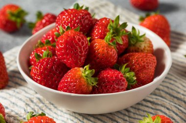 Raw Red Organic Sweet Strawberries in a Bowl Ready to Eat