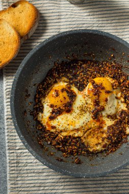 Trendy Homemade Chili Crunch Eggs with Toast