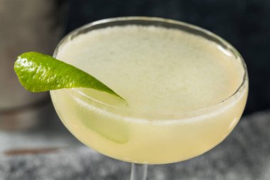 Cold Boozy Elderflower Gin Gimlet Cocktail with Lime