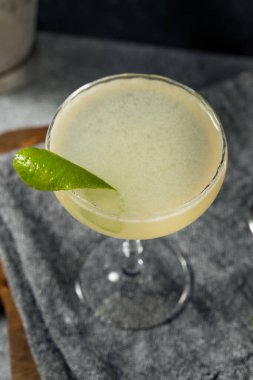 Cold Boozy Elderflower Gin Gimlet Cocktail with Lime