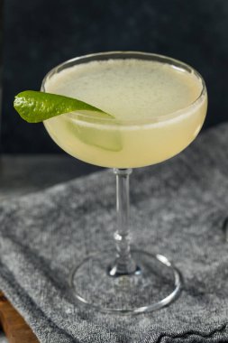 Cold Boozy Elderflower Gin Gimlet Cocktail with Lime
