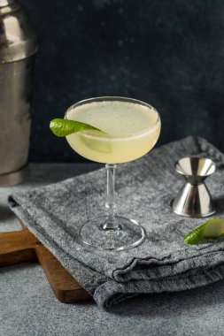 Cold Boozy Elderflower Gin Gimlet Cocktail with Lime