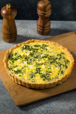 Homemade Feta Spinach Quiche Tart with Eggs and Onion