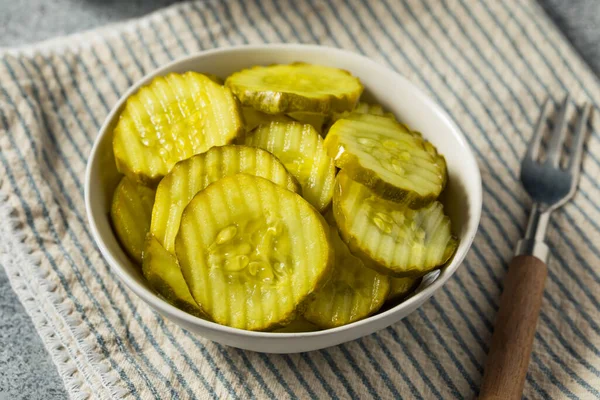 Homemade Preserved Dill PIckle Slices in a Bowl