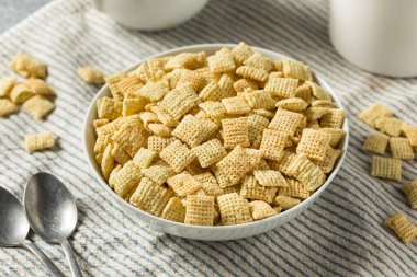 Homemade Puffed Square Rice Cereal for Breakfast in a Bowl
