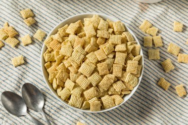 Homemade Puffed Square Rice Cereal for Breakfast in a Bowl