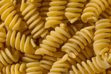 Raw Dry Organic Fusilli Pasta in a Bowl