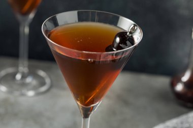 Boozy Cold Rye Manhattan Cocktail with Cherries