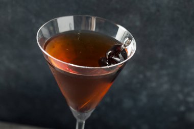 Boozy Cold Rye Manhattan Cocktail with Cherries