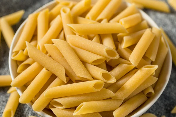Raw Dry Mostaccioli Penne Lisce Pasta Bowl — Stock Photo, Image