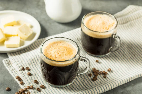 Warm Bulletproof Butter Coffee in a Glass Mug