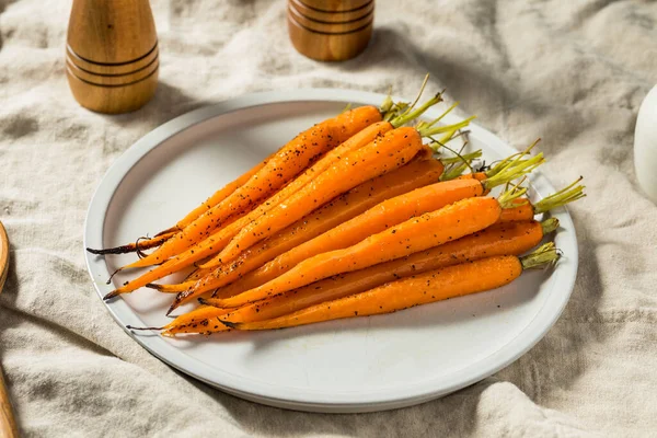 stock image Raw Orange Organic Whole Roasted Carrots with Salt and Pepper