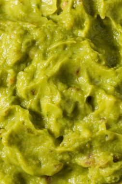 Ev yapımı organik Avokado Guacamole Dip ve Domates.