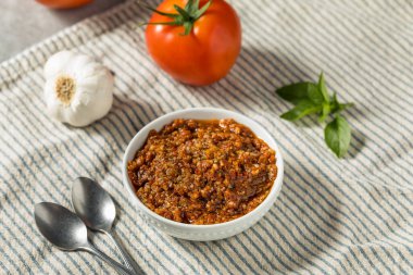 Homemade Red Tomato Pesto Sauce in a Bowl