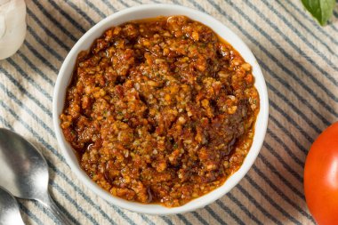 Homemade Red Tomato Pesto Sauce in a Bowl