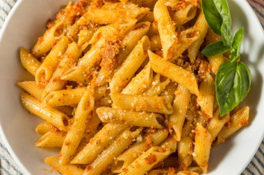 Homemade Tomato Pesto Pasta with Cheese and Basil