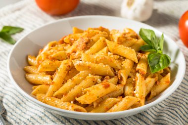Homemade Tomato Pesto Pasta with Cheese and Basil