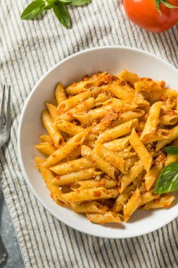 Homemade Tomato Pesto Pasta with Cheese and Basil