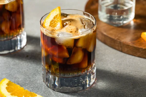 stock image Refreshing Boozy Espresso Tonic Drink with an Orange Garnish