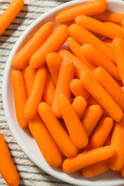 Orange Organic Raw Baby Carrots in a Bowl